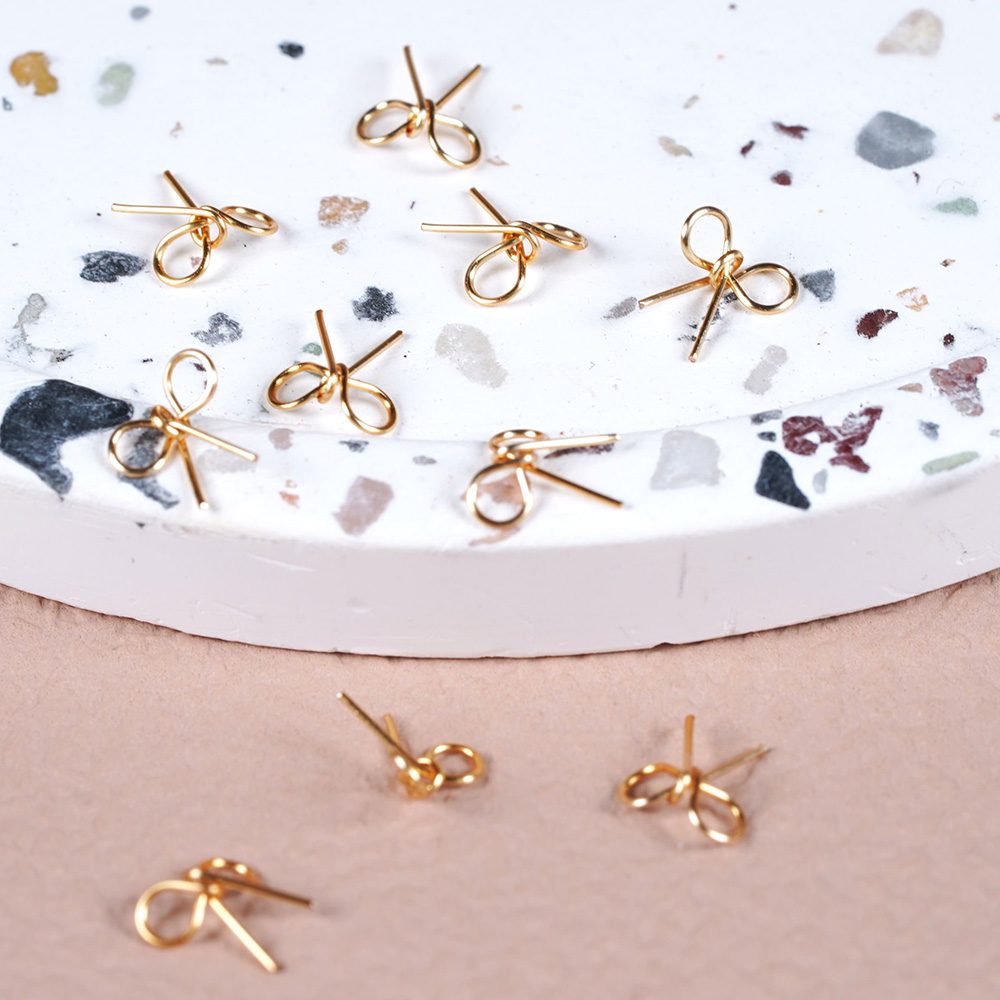 D.nail ワイヤーパーツリボン シャンパンゴールドS 7×7.5mm 10P #8674